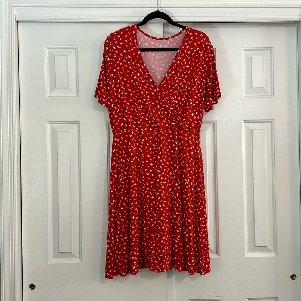 Red patterned dress. Faux wrap
